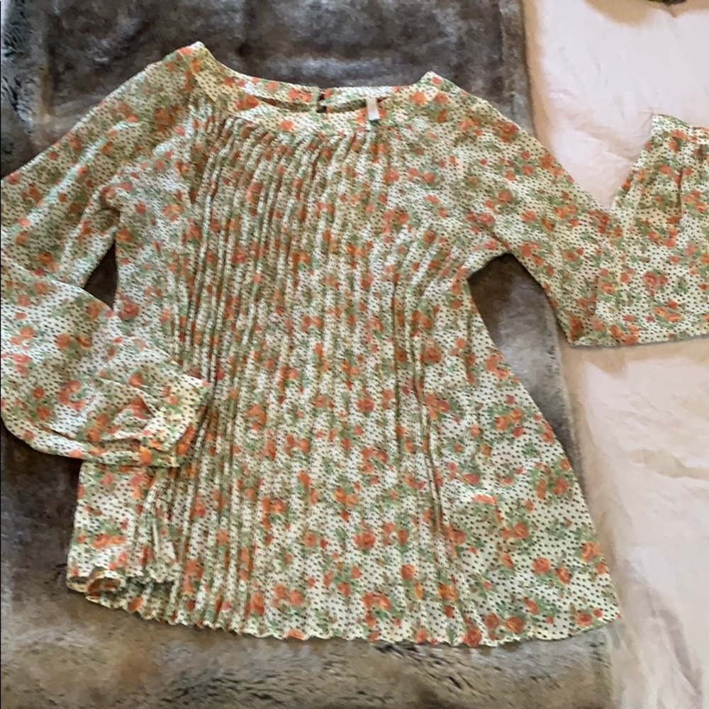 3/$25. Beautiful delicate sheer pleated blouse.